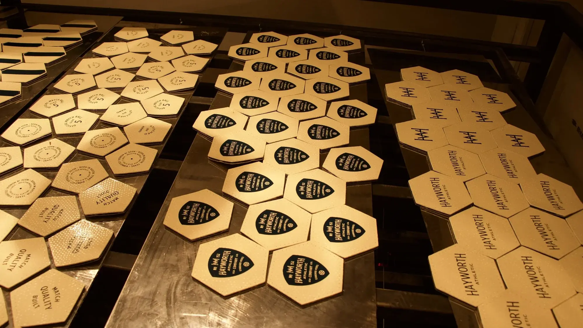 Freshly painted panels drying on the bench in the Mongu&iacute; workshop before assembly. Photograph by Nilson Ceron.