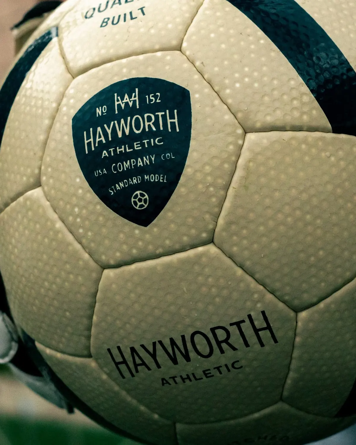 A No. 152 held in goalkeeper&rsquo;s gloves. Photograph by Javid Gomez.