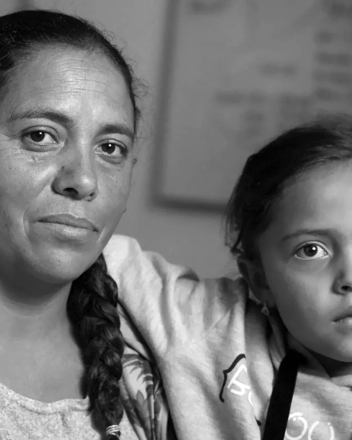 A ballmaker and her daughter in the Mongu&iacute; workshop.