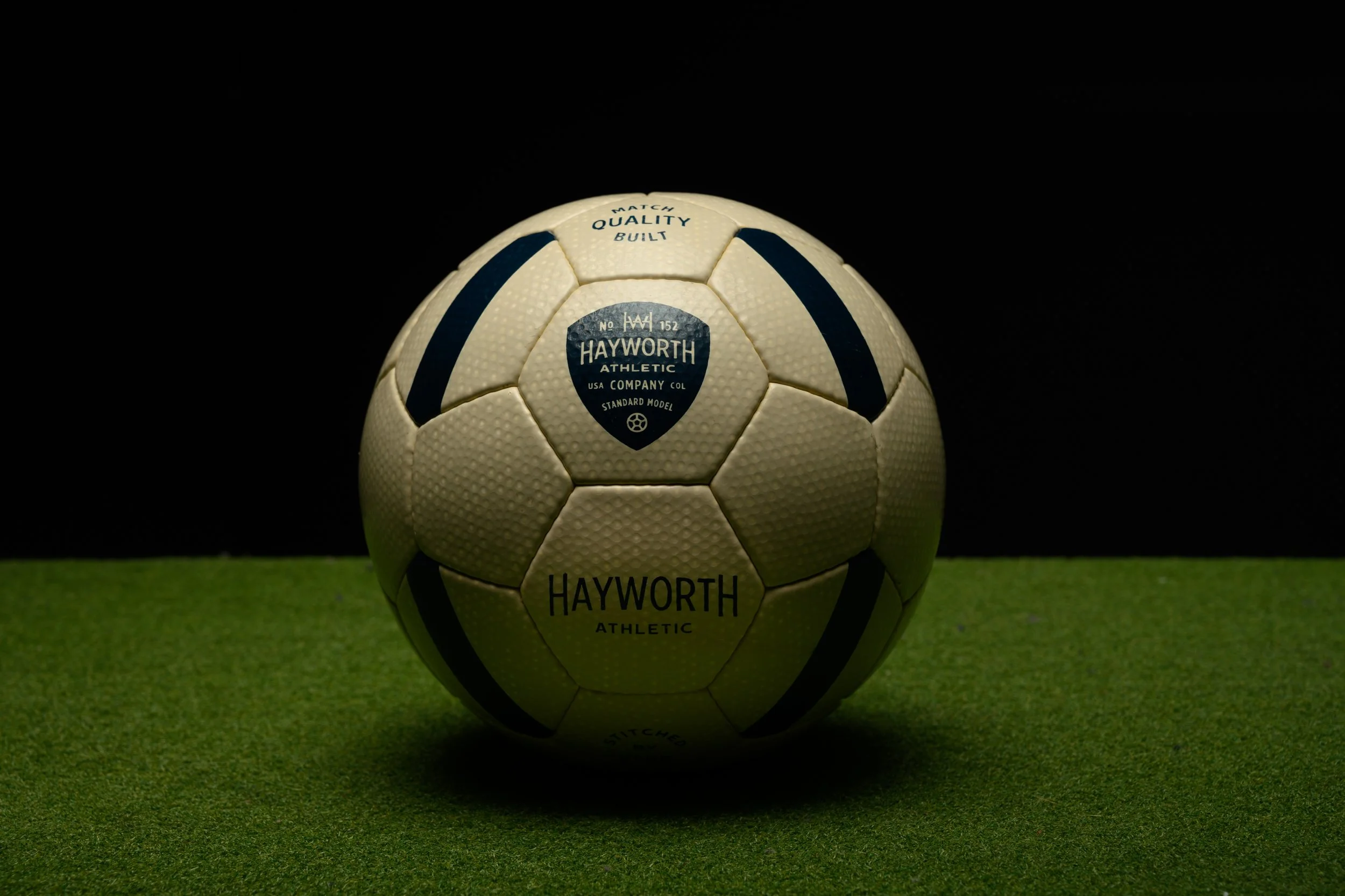 Close-up of Hayworth No. 152 polyurethane leather surface — precision-embossed for consistent flight